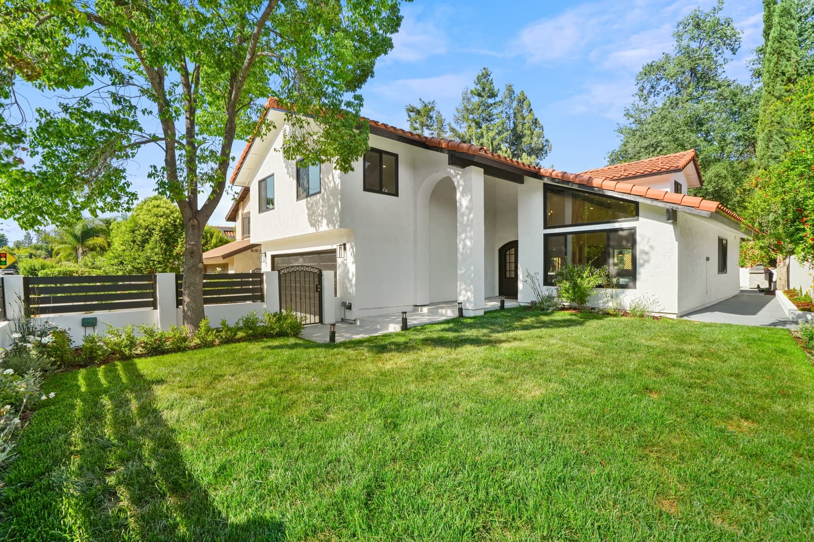 Spanish-style exterior of a Calabasas listing, photographed by VVT