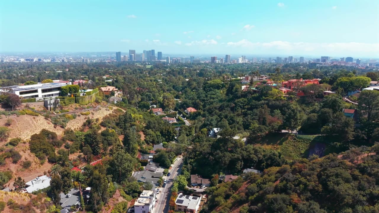 Aerial view over the Bel Air hills toward the Century City skyline, from the 947 N Beverly Glen Blvd listing film